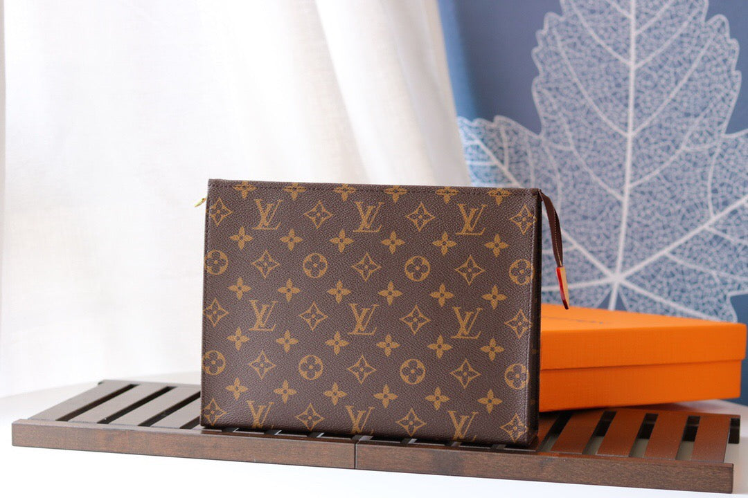 LV Poche Toilette NM Toiletry Bag