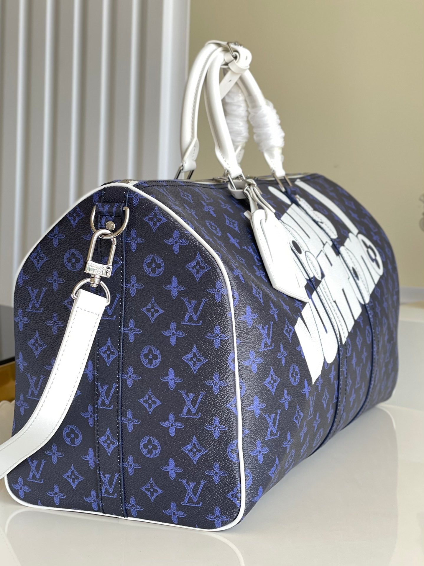 LV KEEPALL BANDOULIERE 55