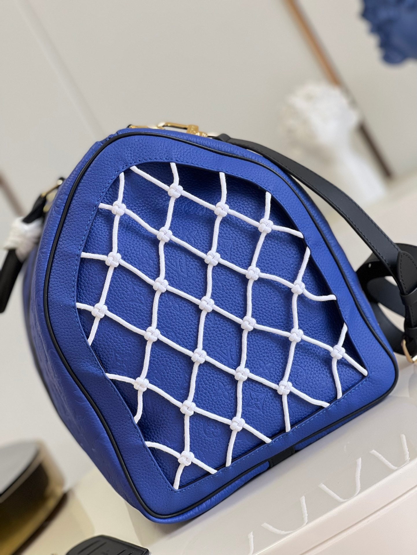 LV KEEPALL BANDOULIÈRE 55