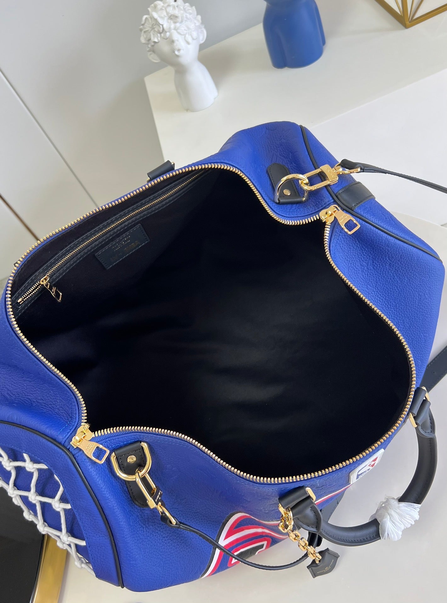 LV KEEPALL BANDOULIÈRE 55