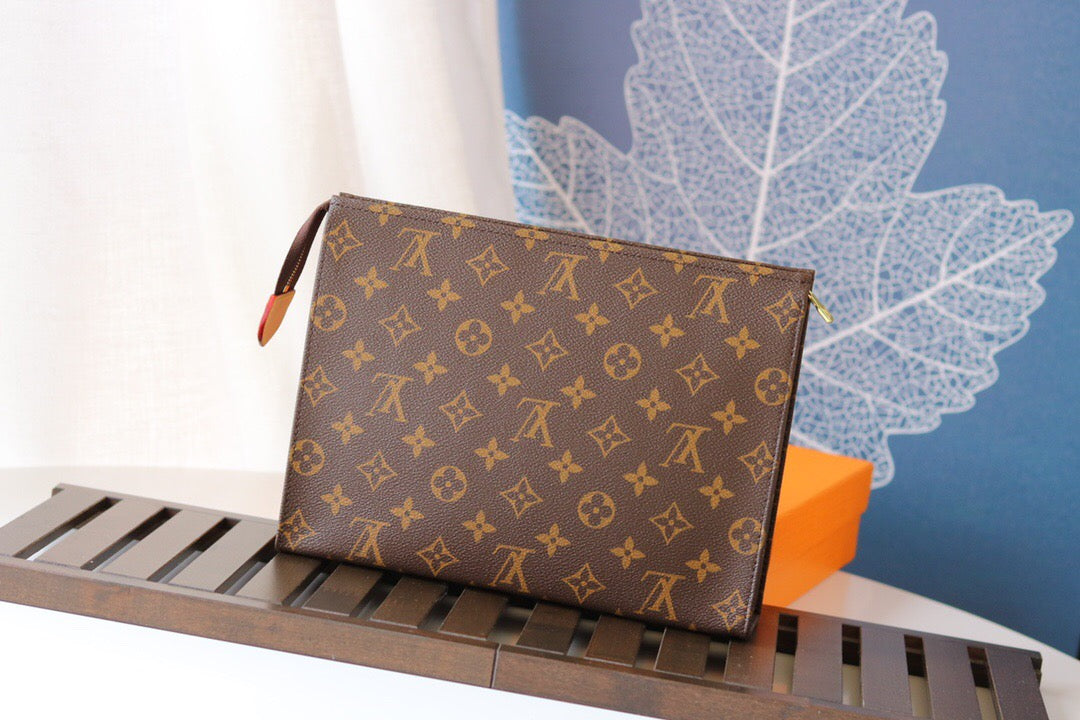 LV Poche Toilette NM Toiletry Bag