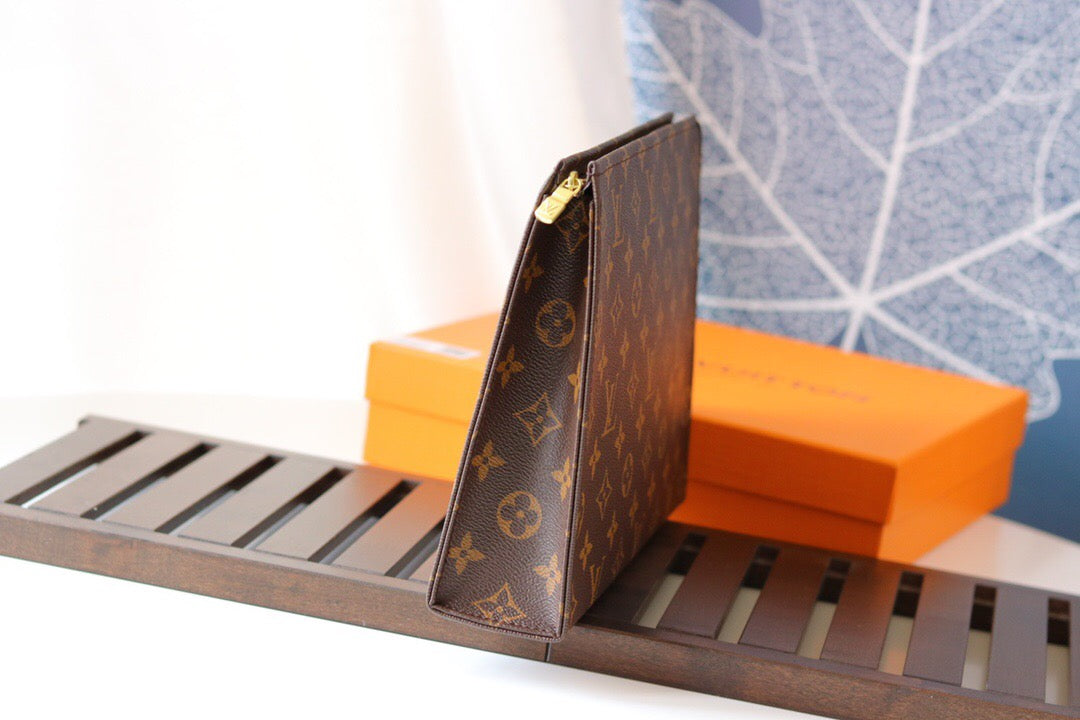 LV Poche Toilette NM Toiletry Bag
