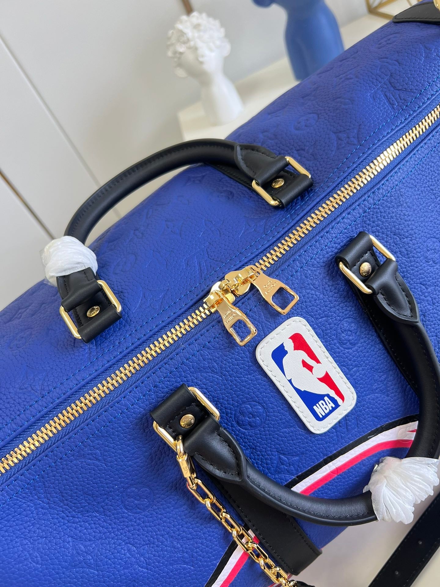 LV KEEPALL BANDOULIÈRE 55