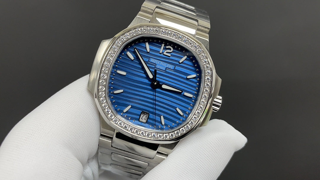 Patek Philippe Nautilus 7118/1200A Ladies Blue Dial Zircon Bezel Stainless Steel