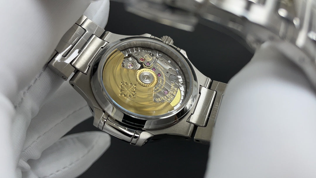 Patek Philippe Nautilus 7118/1200A Ladies Blue Dial Zircon Bezel Stainless Steel